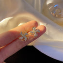 EXQUISITE CRYSTAL ROTATING WINDMILL EARRINGS COMOSO 